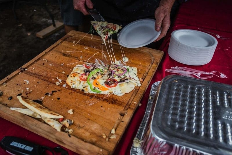 abalone pizza being served