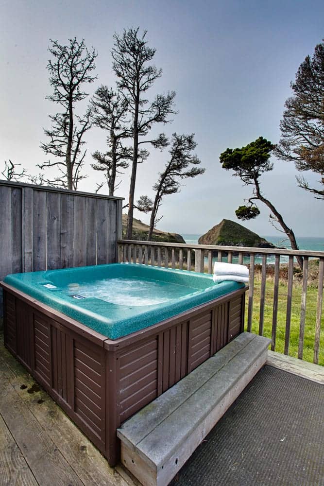a hot tub with an ocean view