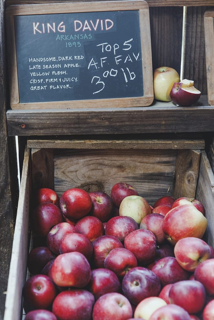 a wooden box of King David apples